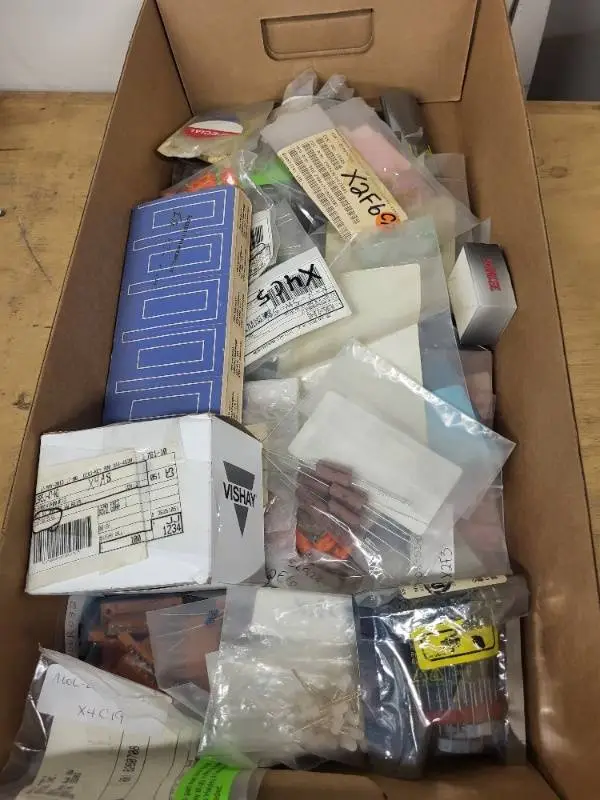Box of Assorted Electronic Connectors, Resistors, and Hardware Components