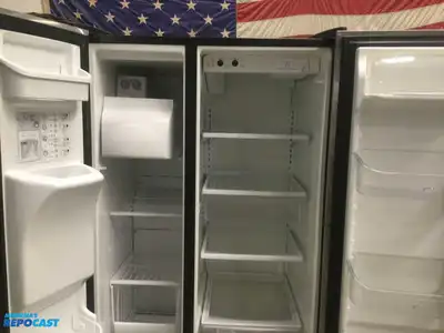 USED FRIGIDAIRE STAINLESS STEEL AND BLACK SIDE BY  SIDE REFRIDGERATOR HIGH EFFICANCY ENERGY STAR