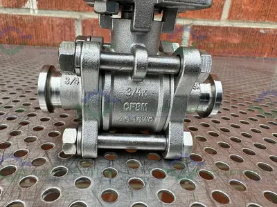 USED FNW FIGURE 330A STAINLESS STEEL BALL VALVE W/ 3/4" SANITARY FITTING