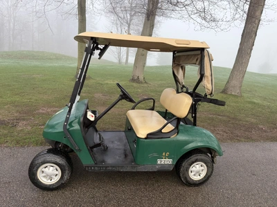 (1) 2017 E-Z-Go golf cart with a Kawasaki gas engine, model 625111G01, includes canopy, ball cover, ...