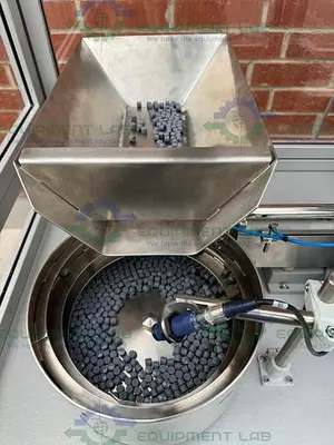 USED ROTEC PISTONMACHINE FOR VIAL CAPS / STOPPERS W/ VIBRATORY FEEDER BOWL