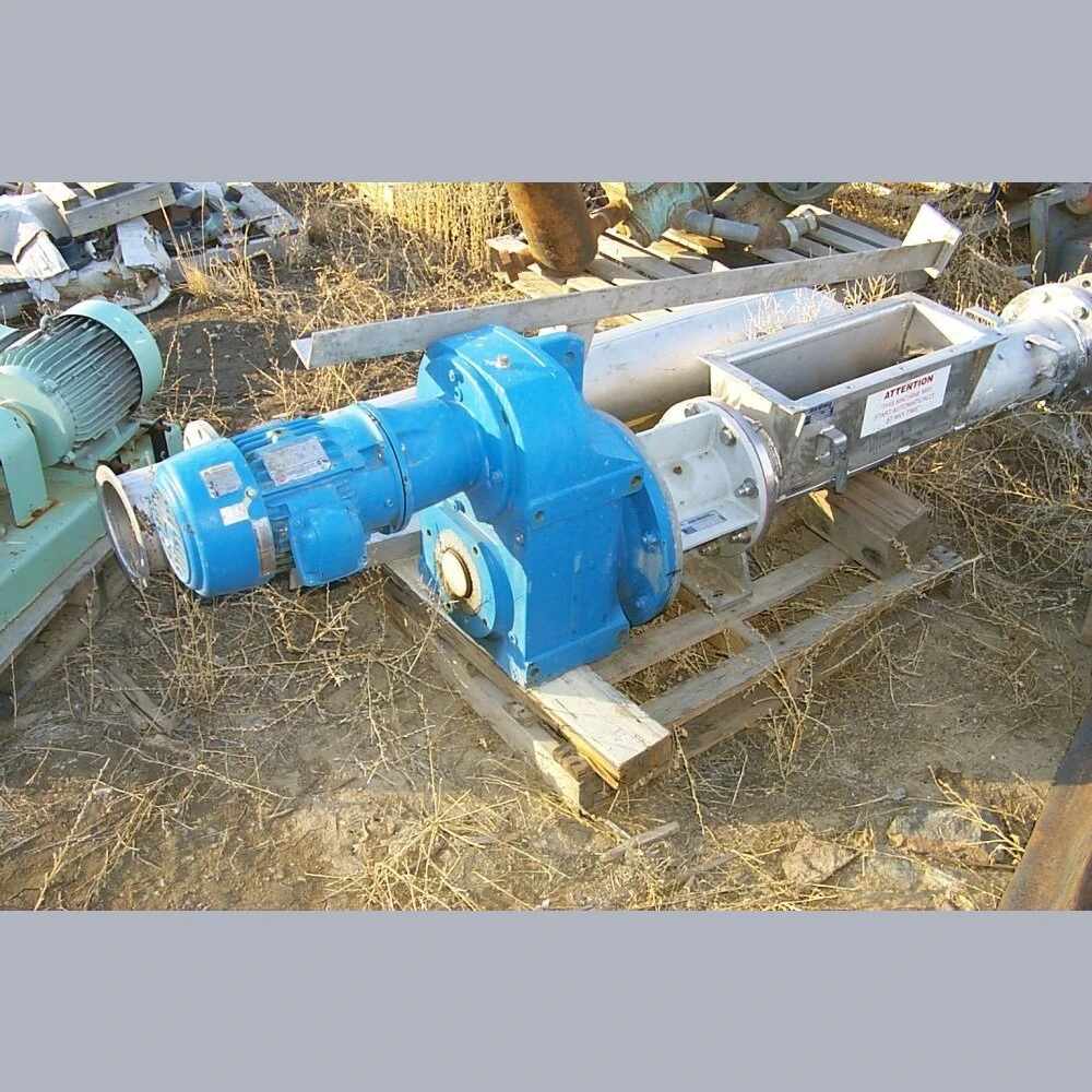 John Meunier 7 in. dia. x 4 ft long rotary screw compactor.  With 156.3-1 ratio Eurodrive gear reducer.  3 HP, 575 volt.