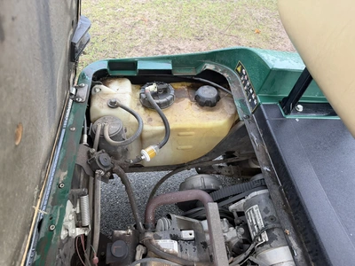 (1) 2017 E-Z-Go golf cart with a Kawasaki gas engine, model 625111G01, includes canopy, ball cover, ...