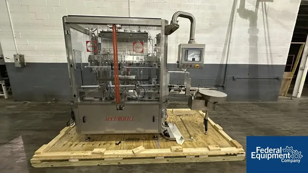 USED Capmatic Capmatic Bottle Filling Line