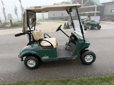 (1) 2015 E-Z-Go golf cart with a Kawasaki gas engine, includes canopy, fold-down windshield, and bal...