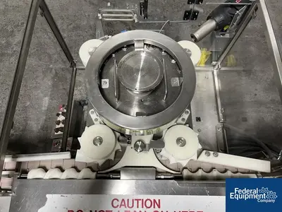 Unknown Rotary Capper, with Conveyor