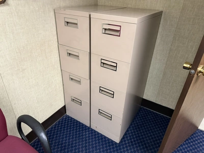 Contents of office furniture, includes (1) steel frame, wood desk, 76" x 38", (2) rolling office cha...