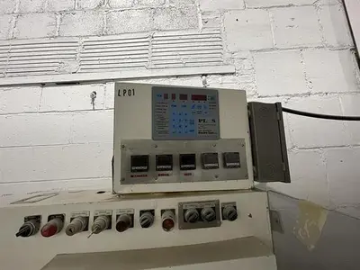 Bartelt model IM7-12 Pouch Packager with AMS Auger Filler