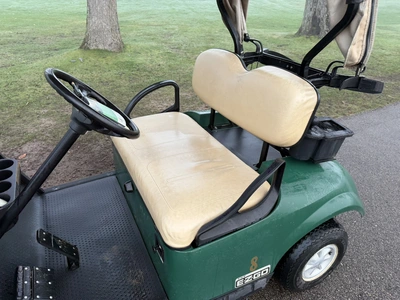 (1) 2015 E-Z-Go golf cart with a Kawasaki gas engine, includes canopy, ball cover, club cover, fold-...