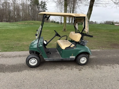 (1) 2015 E-Z-Go golf cart with a Kawasaki gas engine, includes Club canopy and ball washer, fold-dow...