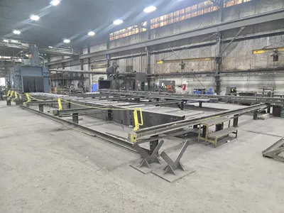 1993 Pangborn 7-Wheel Structural Blast Machine, 24" x 48" Opening, 60' In-Out Conveyors w/ (6) Cross