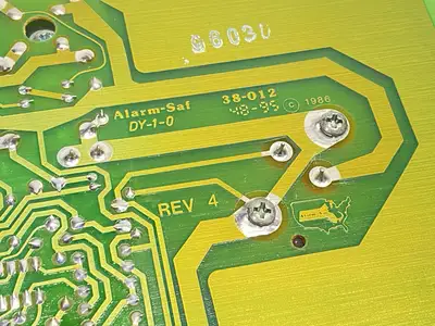 USED ALARM-SAF POWER SUPPLY / BATTERY CHARGER BOARD