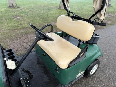 (1) 2015 E-Z-Go golf cart with a Kawasaki gas engine, includes canopy, ball cover, club cover, fold-...