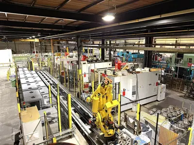 USED FANUC ROBOT + 3 BRETON MACHINING CENTERS 5 AXES