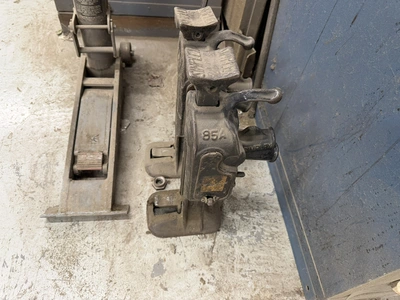 (1) Maximum heavy duty 8800 lb. forklift jack, (2) Simplex 85A, 5-ton capacity jacks.