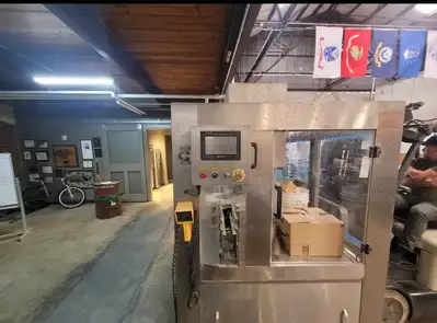 (Reduced!) Palmer 12-Head Rotary Isobaric Canning Line – 35 CPM
