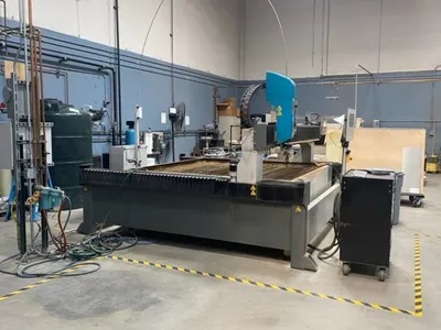 2014 FLOW 014659-1 Waterjet Cutters | Lion Machinery (1)