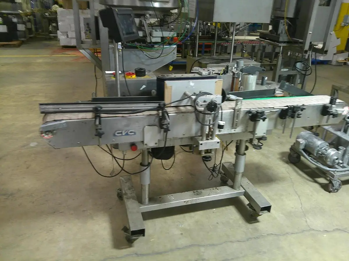 CVC pressure sensitive wrap labeler