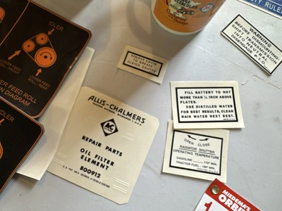 (1) Assorted Allis-Chalmers items including cups, stickers