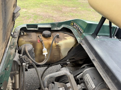 (1) 2015 E-Z-Go golf cart with a Kawasaki gas engine, includes Club canopy, ball washer, fold-down w...