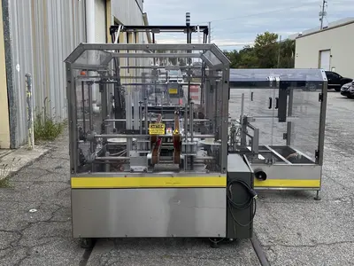 USED ECONOCORP – ECONOSEAL (RANDOLPH, MA) CASE PACKER (ECONOCASER)