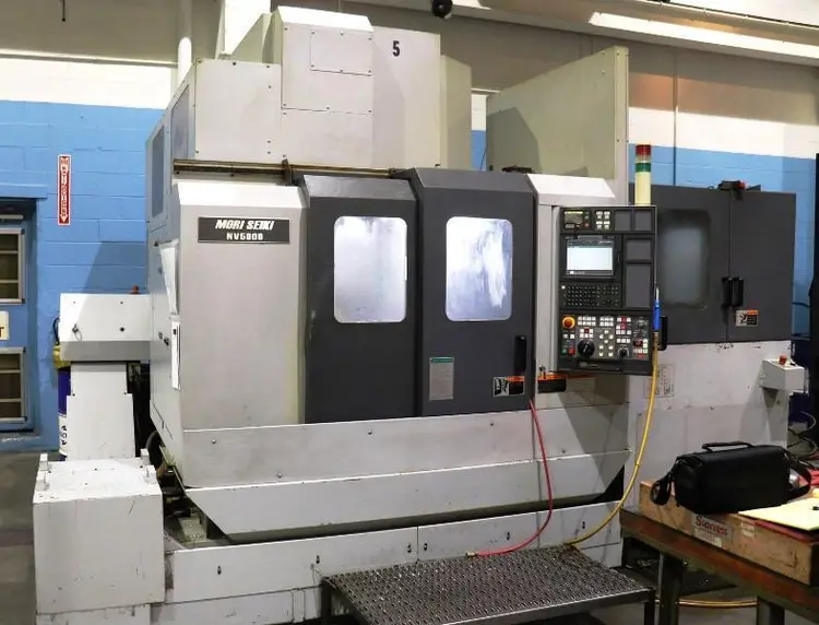 Used 2003 MORI SEIKI NV5000A/40 Vertical Machining Centers (5-Axis or More) Illinois US | BLUMBERG MACHINERY COMPANY #396529