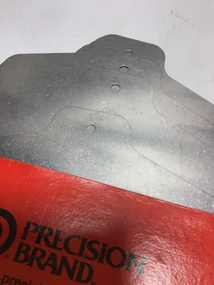 Precision Stainless Slotted Shim Slot Size 1-5/8″ Size D 5″x5″ Gauge .015 (2)