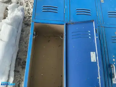 14 door blue metal locker unit 60”x84” (each one is approximately 10”24”x10”)