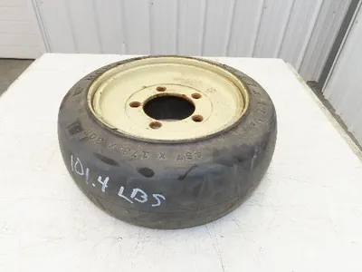 Monarch 18x7x12-1/8 Forklift Tire Smooth Solid Press-on Black 5x138mm Rim
