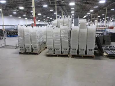 PALLETS AND PALLETS OF FOLDING PLASTIC BINS