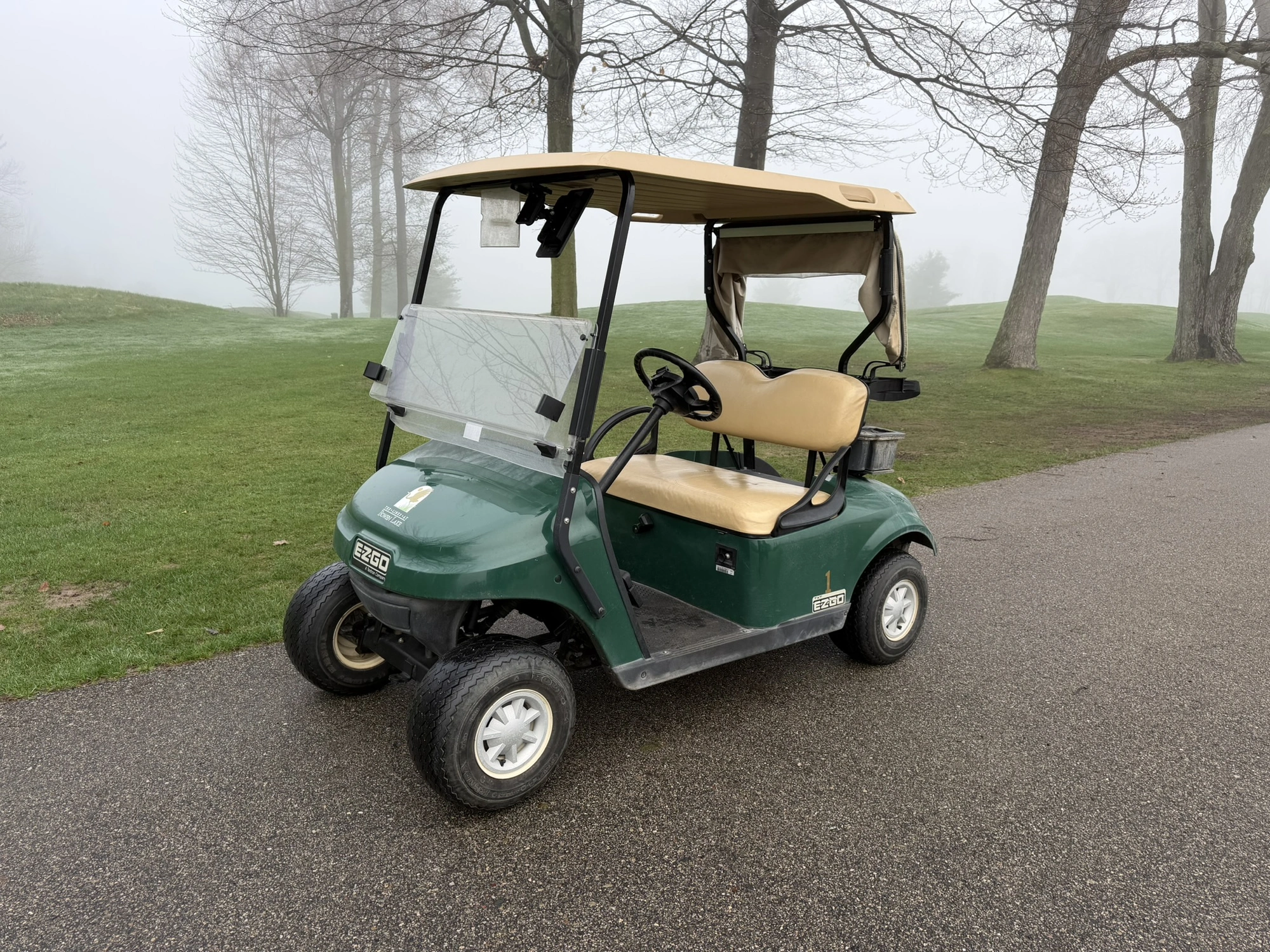 (1) 2015 E-Z-Go golf cart with a Kawasaki gas engine, includes canopy, fold-down windshield, and bal...
