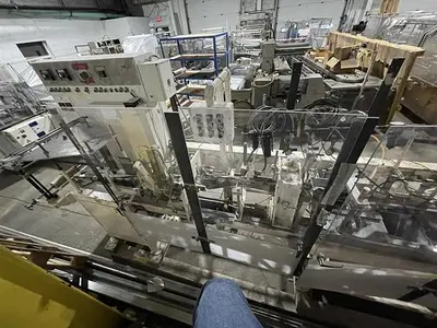 Bartelt model IM7 Pouch Packager with AMS Auger Filler and  liquid filler