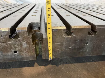 60" WIDE X 108" LONG X 8" THICK T-SLOTTED BOLSTER PLATE. STOCK # 0541526