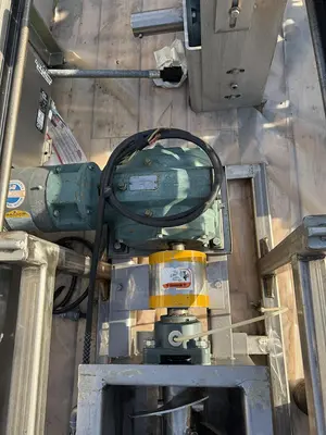 SCREW AND PADDLE CONTINOUS MIXER