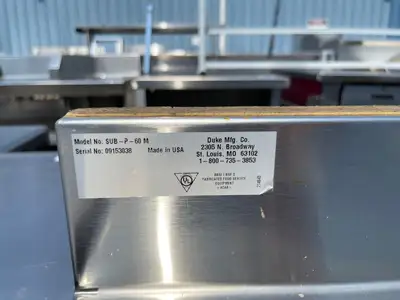 Used Duke Used 60" Duke Stainless Steel Wood Grain Storage Cabinet Work Station - SS243 Food Prep Tables Illinois US | Falcon Restaurant Supply #1375965