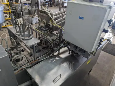 USED 1994 MODERN PACKAGING, INC SL-1X2