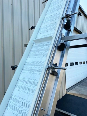PCS Cleated Belt Incline Conveyor