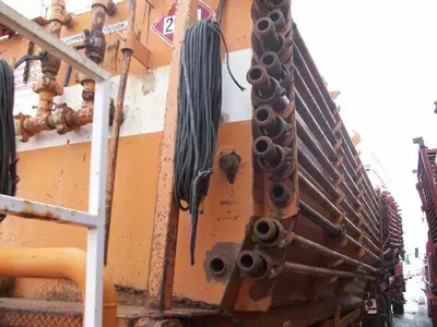 USED 22.5 M3 (140 BBL) SKID MOUNTED 2 COMPARTMENT MUD TANK