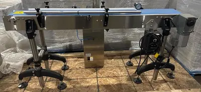 Used Stainless Steel 71” long x 8-1/2” wide motorized conveyor