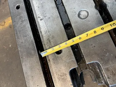 60" WIDE X 108" LONG X 8" THICK T-SLOTTED BOLSTER PLATE. STOCK # 0541526