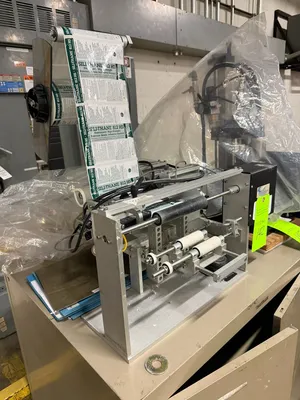 Elmark Packaging R-310 Labeling Machine | Levy Recovery Group (1)