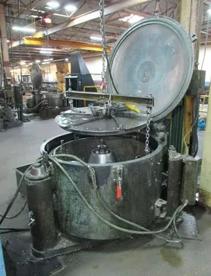 (2) Tolhurst 40" Center-Slung chip wringers.