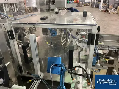 USED Quadrel Quadrel Wrap Around Labeler, Model Rotary
