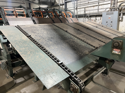 Automated Lumber Handling Pre-Breakup Incline Chain Deck