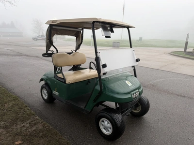 (1) 2015 E-Z-Go golf cart with a Kawasaki gas engine, includes canopy, ball cover, club cover, fold-...