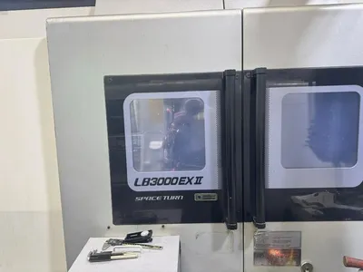 2013 OKUMA LB3000EXII-MYW/800 CNC LATHES | Tight Tolerance Machinery (14)