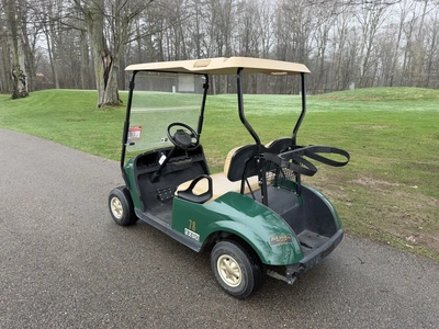 (1) 2014 E-Z-Go golf cart with a Kawasaki gas engine, does not include Club canopy, ball carrier, fo...