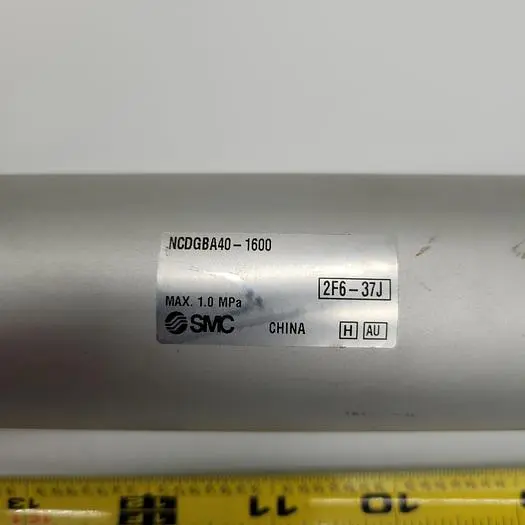 Used SMC SMC NCDGBA40-1600 CYL AIR 1 1/2" BORE 2F6-37J WITH MOUNT BRACKET Misc Fasteners | ND Industrial Surplus #1217998