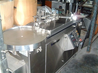 Adtech Model RUICCF-101/RA Vial Filler/Stopper