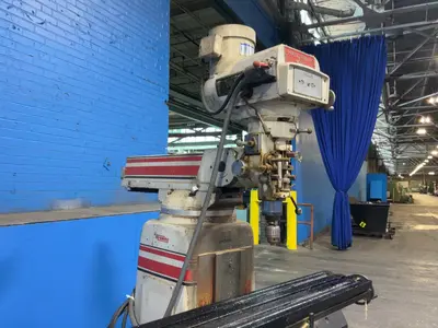 Tri-onics Incorporated 50” X 10”  Vertical Mill